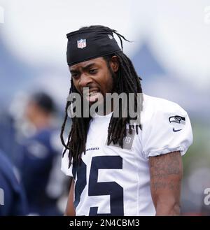 Richard Sherman (25) of the Seattle Seahawks intercepts a pass away from  Davante Adams (17) of the Green Bay Packers in the NFC Championship game at  CenturyLink Field in Seattle, Washington on