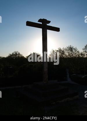 Silhouette of the cross of Christ on a hermitage in Évora, Alentejo. Stock Photo