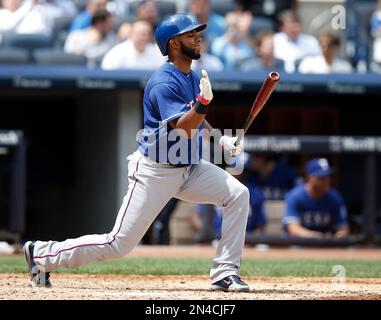 Texas Rangers' Josh Hamilton connects on a two-run home run scoring Elvis  Andrus during the 10th inning of game 6 of the World Series against the St.  Louis Cardinals at Busch Stadium