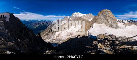 Panoramic view of the summit of Mont Blanc and the peaks south-west of the Mont Blanc massif from Pointe Helbronner. Stock Photo