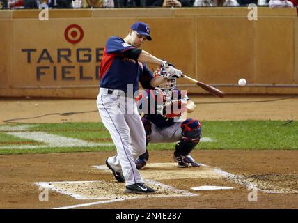 National League's Justin Morneau, of the Colorado Rockies, hits during the  MLB All-Star baseball Home Run Derby, Monday, July 14, 2014, in  Minneapolis. (AP Photo/Jeff Roberson Stock Photo - Alamy