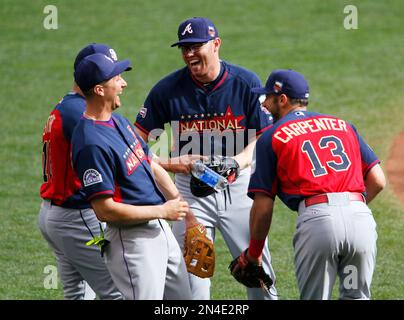 Atlanta Braves All-Star Freddie Freeman is presented his All-Star jersey by  his wife, Chelsea, and son Charlie before the Braves played the Toronto  Blue Jays in a baseball game Tuesday, July 10