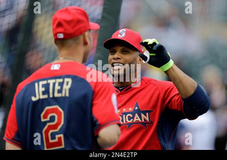 American League's Derek Jeter (R) watches as teammate Robinson Cano takes  some swings during batting practice before the 2014 MLB All Star Game at  Target Field on July 15, 2014 in Minneapolis.