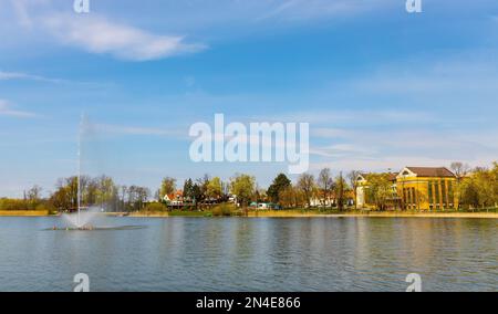 Elk, Poland - May 1, 2022: Panoramic view of Elk town center at Jezioro Elckie lake shore in Masuria region of Poland Stock Photo