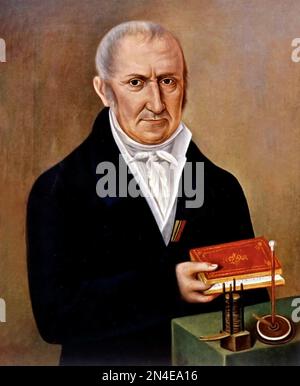 Alessandro Volta. Portrait of the Italian chemist and inventor of the battery, Alessandro Giuseppe Antonio Anastasio Volta (1745-1827) with two of his inventions: the electric battery and the electrophorus Stock Photo