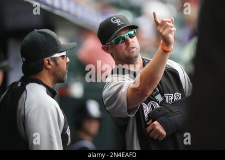 Colorado Rockies' Vinny Castilla, right, is congratulated by teammate  Jeromy Burnitz after his eighth inning homerun in the Rockies 5-2 victory  over the San Diego Padres Sunday Sept. 5, 2004 in San