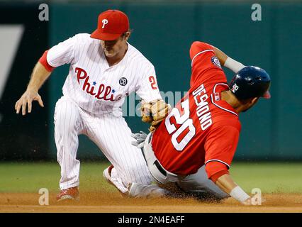 Washington Nationals' Ian Desmond, right, tags out New York Mets' Mike  Nickeas during the sixth inning of a baseball game on Saturday, April 9,  2011, at CitiField in New York. (AP Photo/Frank