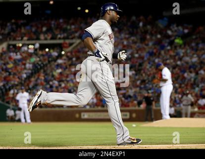 Houston Astros' Chris Carter rounds first after a solo home run