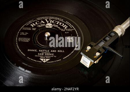 Sam Cooke singing Shake Rattle and Roll from RCA Victor on a 45RPM single vinyl record playing on a turntable Stock Photo