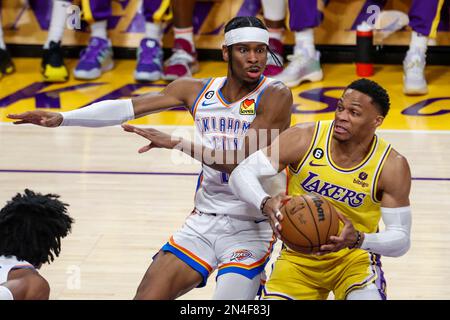 Los Angeles Lakers guard Russell Westbrook (R) drives against Oklahoma City Thunder guard Shai Gilgeous-Alexander during an NBA basketball game.Final scores; Thunder 133:130 Lakers Stock Photo