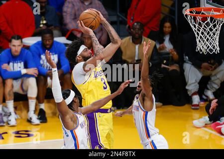 Los Angeles Lakers forward Anthony Davis (C) shoots against the Oklahoma City Thunder during an NBA basketball game.Final scores; Thunder 133:130 Lakers Stock Photo