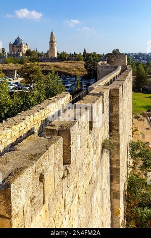 Jerusalem, Israel - October 12, 2017: Walls of Old City over Hativat Yerushalayim street with Armenian quarter of Jerusalem Stock Photo
