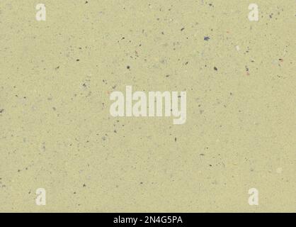Yellow handmade paper. It contains fragments of other paper. Meant as background Stock Photo