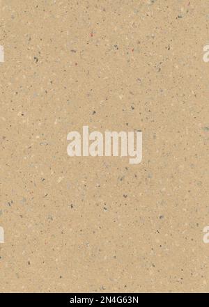 Brown handmade paper. It contains fragments of other paper. Meant as background Stock Photo