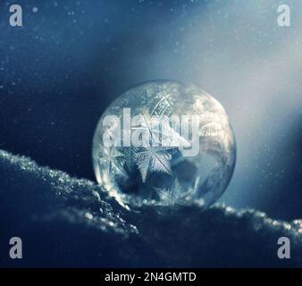 Frozen bubble, soap bubble in the frost Stock Photo
