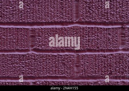 Painted dark pink brick wall texture background, close up Stock Photo