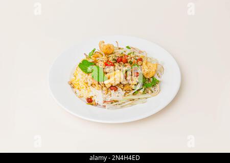 Com hen Hoi An, Vietnamese rice dish with baby basket clams rice, Vietnamese food isolated on white background; perspective view