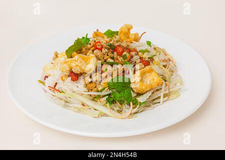 Com hen Hoi An, Vietnamese rice dish with baby basket clams rice, Vietnamese food isolated on white background; close-up