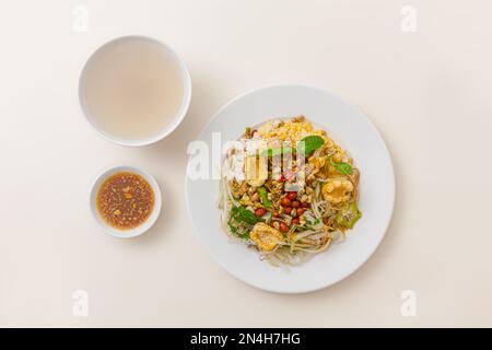 Com hen Hoi An, Vietnamese rice dish with baby basket clams rice, Vietnamese food isolated on white background; top view Stock Photo