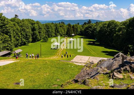 Swiety Krzyz, Poland - June 5, 2022: Swietokrzyskie Mountains panorama with Lysa Gora, Swiety Krzyz mount hilltop near Nowa Slupia village Stock Photo