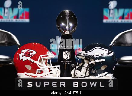 Phoenix, United States. 07th Feb, 2023. The Vince Lombardi Trophy stands  between the Philadelphia Eagles and Kansas City Chiefs helmets before a Super  Bowl press conference in the media center in Phoenix