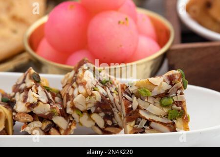 Khajur Barfi Or Khajoor Dry Fruits Burfi Made Of Dates, Anjeer, Kaju, Cashew Nuts, Raisins, Kismis, Pista, Poppy Seeds, Almonds, Pistachio, Badam, Maw Stock Photo