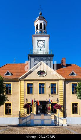 Trzebiatow, Poland - August 11, 2022: Classicist Ratusz town hall palace at Rynek main market square in historic old town quarter of Trzebiatow Stock Photo