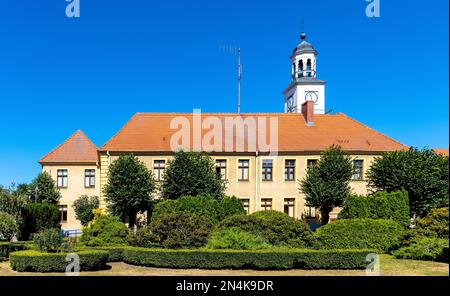 Trzebiatow, Poland - August 11, 2022: Classicist Ratusz town hall palace at Rynek main market square in historic old town quarter of Trzebiatow Stock Photo