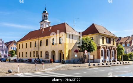 Trzebiatow, Poland - August 11, 2022: Classicist Ratusz town hall palace at Rynek main market square in historic old town quarter of Trzebiatow Stock Photo