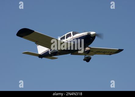 A Piper PA-28-180 Cherokee departs Netherthorpe airfield Nottinghamshire Stock Photo