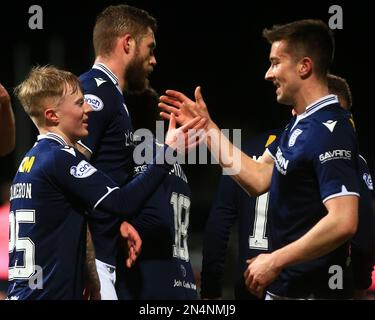 Dundee, Scotland, UK. 8th February 2023;  Dens Park, Dundee, Scotland:  SPFL Trust Football, Dundee versus Raith Rovers; Lyall Cameron of Dundee is congratulated after scoring for 2-0 by Cammy Kerr in the 28th minute Credit: Action Plus Sports Images/Alamy Live News Stock Photo