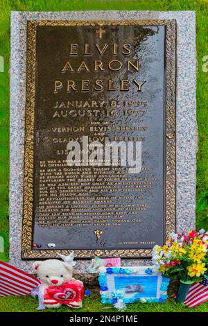 The bronze marker on Elvis Presley’s Grave in the Meditation Garden at Graceland, his home in Memphis, Tennessee. Stock Photo
