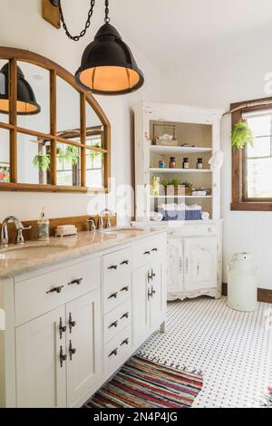 Shared bathroom with white wooden his and hers sink cabinet with quartz ...
