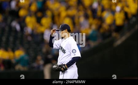 Fans in the Kings Court section cheer for Seattle Mariners starting  pitcher Felix Hernandez (34) after a strikeout in the fifth inning of a  baseball game against the Milwaukee Brewers, Sunday, Aug.