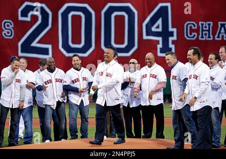 Former Boston Red Sox's Manny Ramirez steps on the field at Fenway Park  before ceremonies held to present him with his Boston Red Sox Hall of Fame  plaque before a baseball game