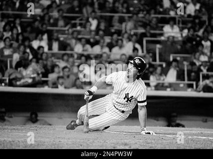 New York Yankees batter Don Mattingly reacts to a foul ball before his  first inning single against the Toronto Blue Jays at night on Wednesday,  Oct. 1, 1986 in New York at