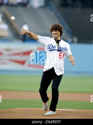 27 May 2014: Former Dodger Korean pitcher Chan Ho Park throws out the first  pitch during a Major League Baseball game between the Cincinnati Reds and  the Los Angeles Dodgers at Dodger