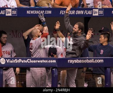 Boston Red Sox's Jonny Gomes (L) congratulates Mike Napoli after