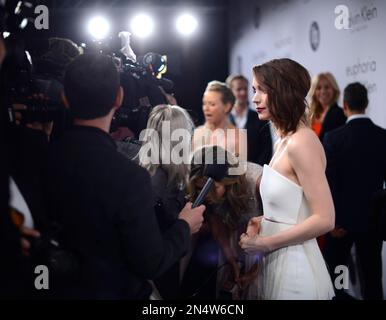 Three women being interviewed in World Naked Bike Ride in Bristol 2022