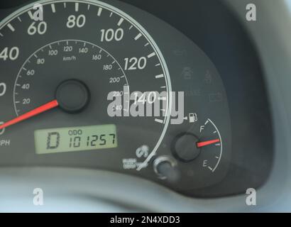 Car speedometer in sunlight with gas showing Stock Photo