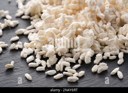 Close-up of rice koji placed on black background. Koji. Koji is fermented rice. Stock Photo