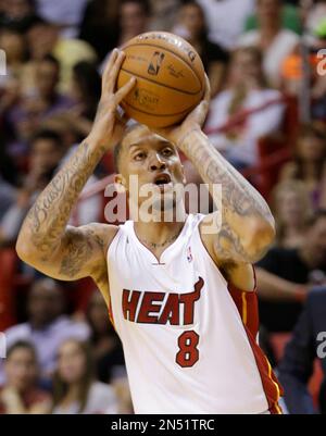 Miami Heat rookie forward Michael Beasley follows through after a shot  during an NBA preseason game against the New Jersey Nets in Paris on  October 9, 2008. The Nets won the contest