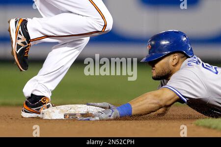 Baltimore Orioles shortstop J.J. Hardy (2) slides into third base