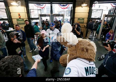 Moose, the Seattle Mariners' mascot, greets George The Moose Man King  outside Safeco Field prior to the Mariners' home opener MLB baseball game  against the Oakland Athletics, Friday, April 13, 2012, in