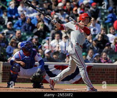 Philadelphia Phillies' Chase Utley watches his solo home run