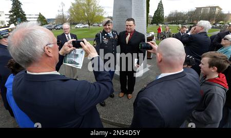 The Atlanta Braves honor seven Congressional Medal of Honor recipients Col.  Donald Ballard, from left to right, Sgt. Gary Beikirch, Maj Gen Pat Brady,  Col. Bruce Crandall, Col. Joe Jackson, Sgt. Maj.