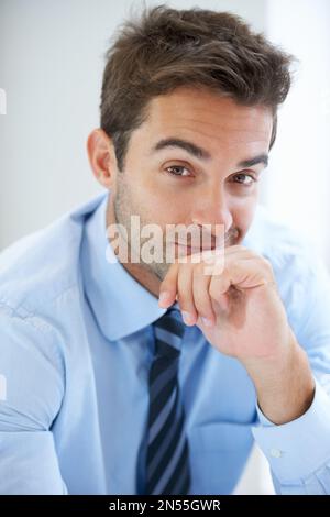 The modern professional. a handsome young businessman at work. Stock Photo