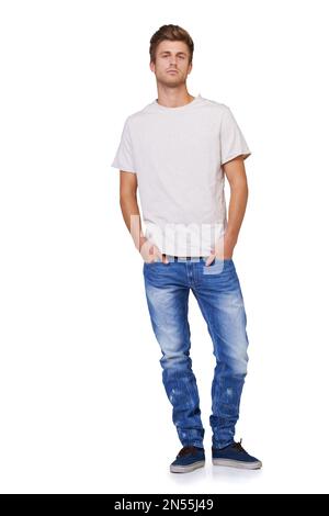 Hes a casual and cool guy. Full length portrait of a casually-dressed young man with his hands in his pockets. Stock Photo