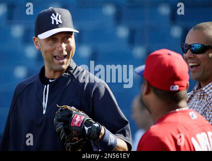 https://l450v.alamy.com/450v/2n561ey/new-york-yankees-shortstop-derek-jeter-left-chats-with-former-teammate-and-current-philadelphia-phillies-designated-hitter-bobby-abreu-center-before-a-spring-exhibition-baseball-game-between-their-two-teams-in-tampa-fla-tuesday-march-25-2014-ap-photokathy-willens-2n561ey.jpg