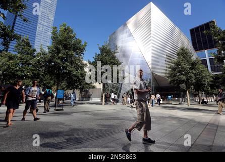 https://l450v.alamy.com/450v/2n56863/file-in-this-sept-6-2013-file-photo-a-visitor-to-the-national-september-11-memorial-and-museum-takes-in-the-sight-as-he-walks-past-the-museum-in-new-york-the-long-awaited-museum-dedicated-to-the-victims-of-the-sept-11-terror-attacks-will-open-to-the-public-at-the-world-trade-center-site-on-may-21-officials-announced-monday-march-24-2014-ap-photomary-altaffer-file-2n56863.jpg